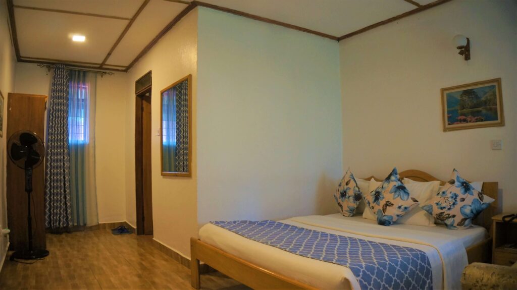 buchen-kinderfreundliche-safari angebote-Buchung-Unterkunft -safari für paare-afrika reise mit kleinen kindern-uganda safari-fort-portal-ataco-hotel