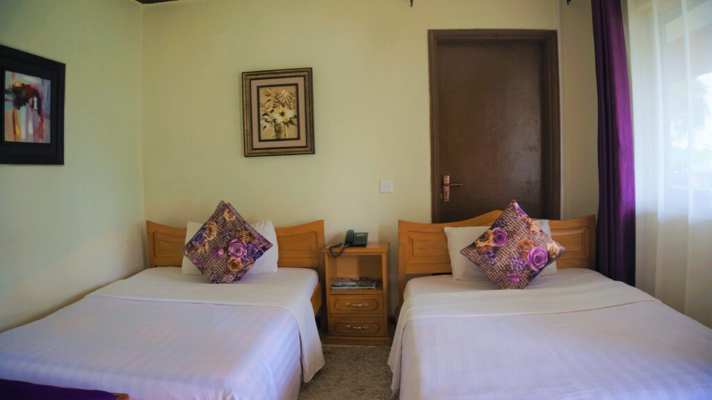 book-fort portal-hotel-ataco country resort-acommodation-tourist attraction-uganda-twin-room-garden-view-cottage